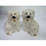 A pair of Beswick miniature Staffordshire dog figurines. Estimate £20-30.