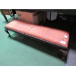 Low footstool on ball feet upholstered with deer hide, 133cms x 40cms x 32cms. Estimate £20-40.