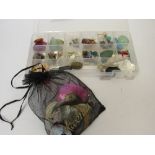 Case of mother of pearl buttons & beads & other semi-precious stones. Estimate £10-20.