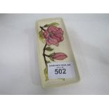 Moorcroft magnolia rectangular dish. Estimate £10-20.