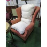 Wing armchair. Estimate £40-60.
