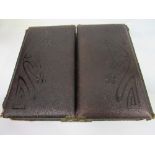 A late Victorian photograph album containing approx. 43 family photographs. Estimate £10-20.