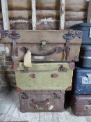 Two vintage canvas-covered travel cases and one other
