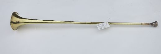 Adjustable brass post horn by Boosey & Hawkes, London, no. 436956, with silver coloured mouth piece.