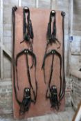 PAIR set of breastcollar harness possibly German, with crests on the bridles