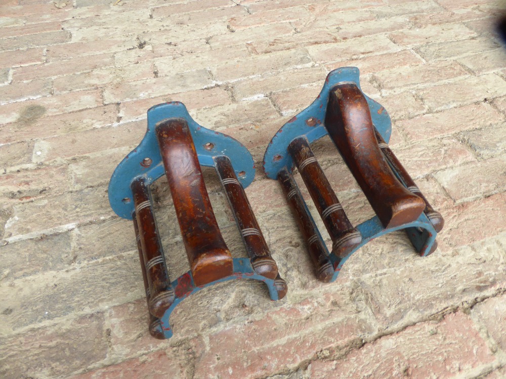 Two mahogany and metal collar racks by Musgrave, Belfast