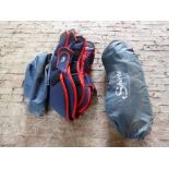 Two sets of full size navy and red travel boots by Shires with covers