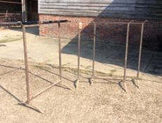 Three metal shaft stands