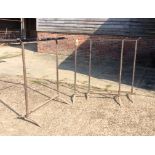 Three metal shaft stands