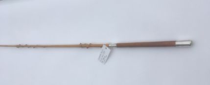 A delicate lady's holly driving whip by Swaine with silver ferrule and butt cap hallmarked London