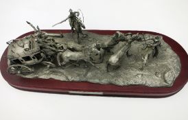 An unusual Franklin Mint limited edition pewter model of a Wells Fargo mail coach and team being