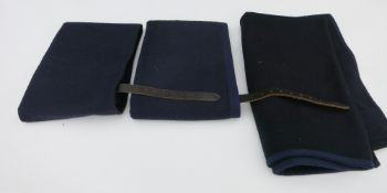 Two navy Melton coaching aprons and a matching knee rug