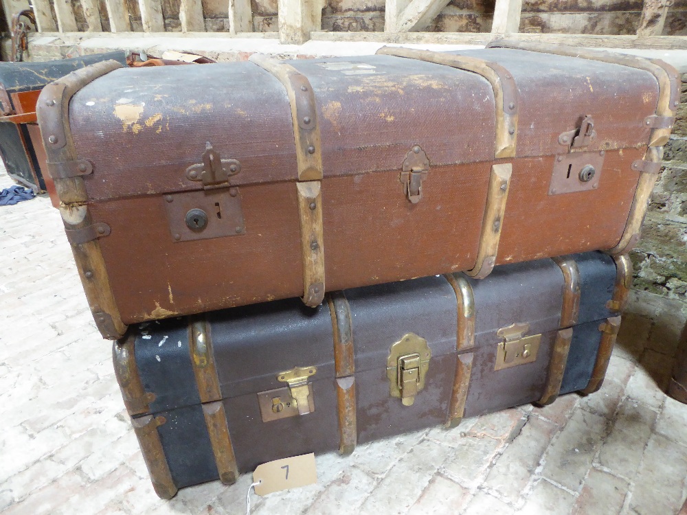 Two travel trunks