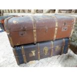 Two travel trunks