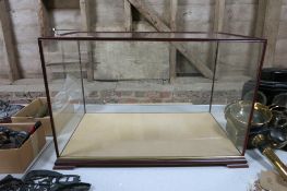 A glass display case for a model. Measures 26¼ins wide x 15¼ins deep x 17½ins high