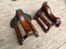 Two mahogany and metal collar racks by Musgrave, Belfast