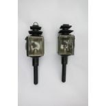A pair of black/whitemetal carriage lamps with square fronts and pagoda tops. Measuring 18ins