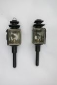 A pair of black/whitemetal carriage lamps with square fronts and pagoda tops. Measuring 18ins