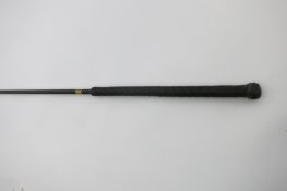 Black jointed fibreglass exercise whip. Approx. length 78ins, plus thong