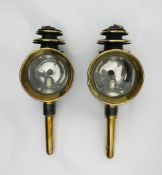 Pair of black/brass round fronted carriage lamps with pagoda tops. Measuring 17½ins long x 6ins