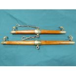 Superb pair of team bars of varnished wood with brass furniture