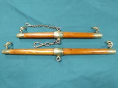 Superb pair of team bars of varnished wood with brass furniture