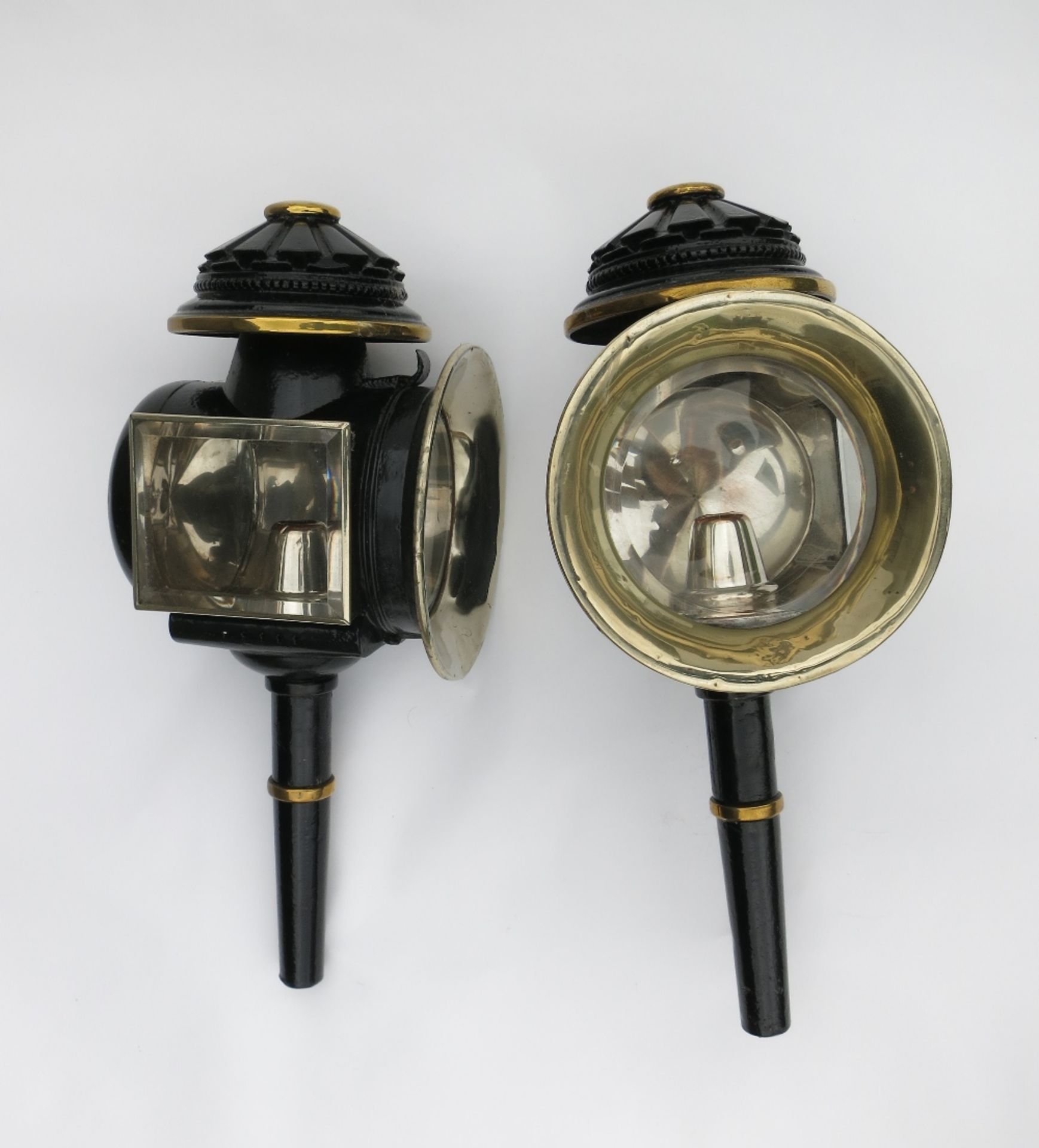 Pair of black/brass Brake lamps with round fronts and pie crust tops. Measuring 21ins long x 8½ins