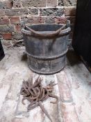 A wooden metal-bound well bucket and a quantity of metal hooks for team and leader bars