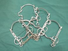 Two Buxton and two Liverpool stainless steel bits with bottom bars and curb chains - 3 x 6ins and