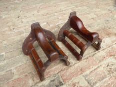 Two mahogany and metal collar racks by Musgrave, Belfast