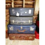 Four various suitcases including 'His & Hers' suitcases from a classic or vintage car (handles