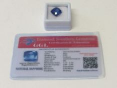 Natural blue cushion cut sapphire, wt 8.5 carat, with certificate. Estimate £50-70.