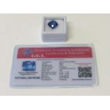 Natural blue cushion cut sapphire, wt 8.5 carat, with certificate. Estimate £50-70.