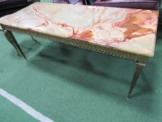 Rectangular onyx top on brass base coffee table, 120cms x 50cms x 50cms. Estimate £30-40.