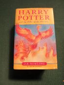 Harry Potter 1st edition, Order of The Phoenix with dust cover. Estimate £40-50.