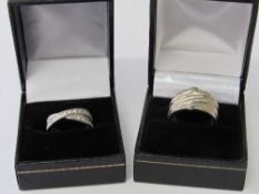 2 sterling silver lady's rings, sizes O & P 1/2. Estimate £18-25