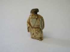 Ivory Netsuke signed to base (with some damage)