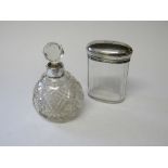 Silver topped glass dressing table pot, London 1911 & a silver topped cut glass toilet water bottle,