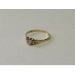 9ct gold solitaire ring, size N. Estimate £30-40.