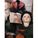 Geisha girl doll by Val Adams, 2001 (needs re-stringing). Estimate £30-50.