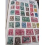 2 stamp albums with various GB & World stamps. Estimate £10-20.