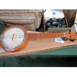 Banjolele, circa 1920's. Estimate £30-40.