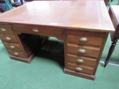 Large Partners' oak desk with leather skiver, drawers to one side & cupboards to the