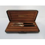 Papermate 2-tone gold & black ball point pen & pencil set in a box. Estimate £10-20.