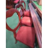 8 mahogany dining chairs with upholstered squabs. Estimate £100-120.