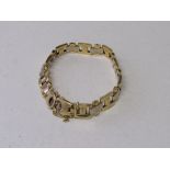 18ct gold gate link bracelet, 24.4grams. Estimate £450-500.