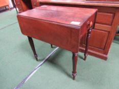 Small mahogany Pembroke table on turned legs, 74cms x 92cms x 74cms. Estimate £40-60.