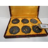 Box containing 6 Japanese Katana Tsuba sword hand guards. Estimate £30-50.