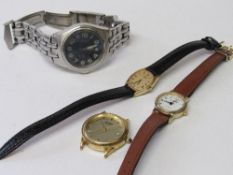 A Seiko quartz lady's wrist watch together with 3 other wristwatches. Estimate £10-15.