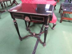 Ebonised & ormolu display table with drawer and drop sides, 63cms x 42cms x 70cms. Estimate £40-50.